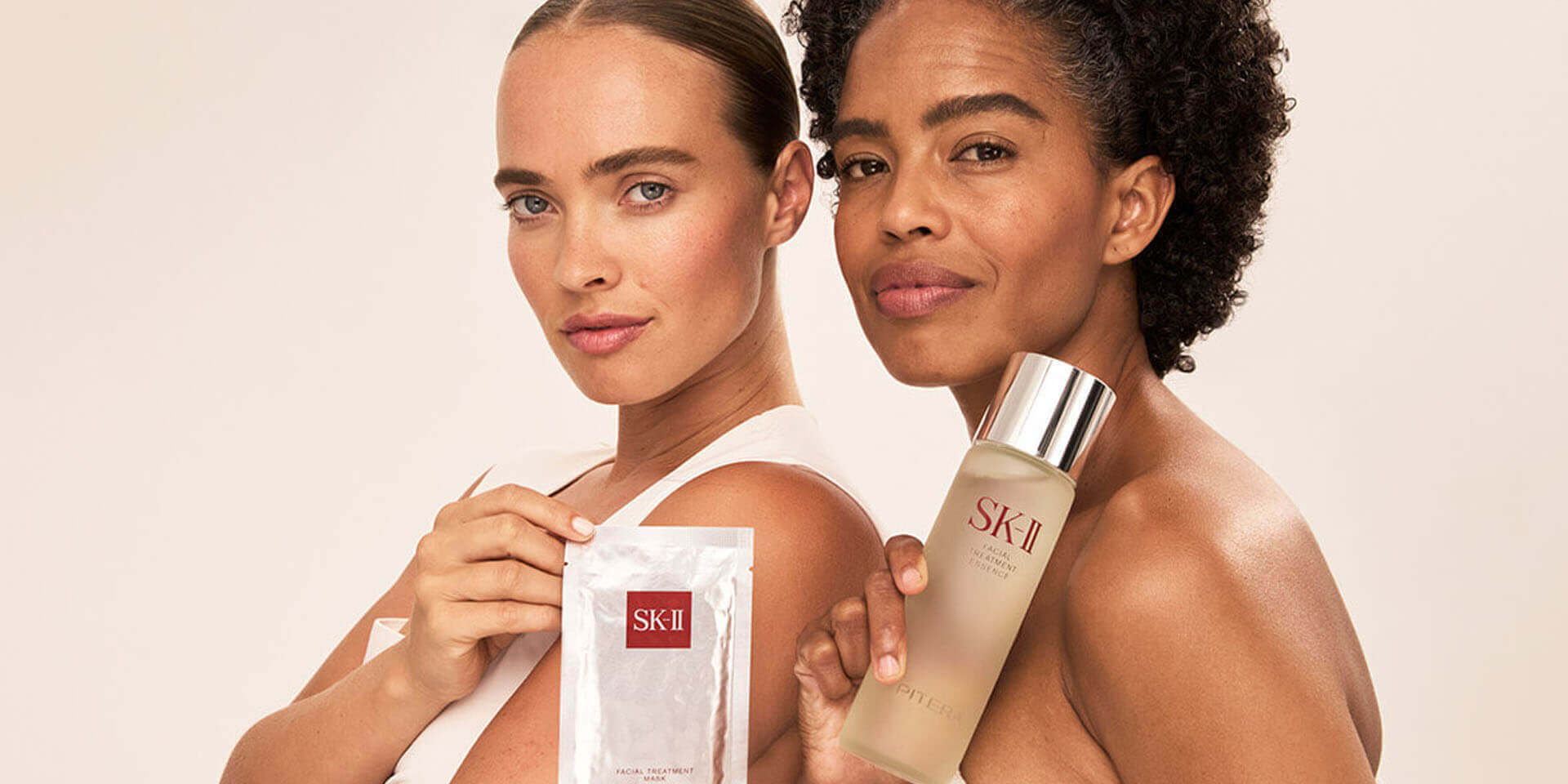 Applying SKINPOWER Essence anti-aging serum as part of your daily day and night skincare routine step.