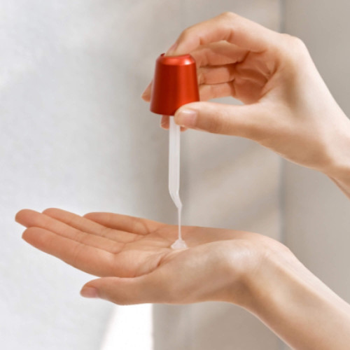 SK-II SKINPOWER Essence is a pore minimizing anti aging serum that hydrates and reduces the appearance of fine lines slide2